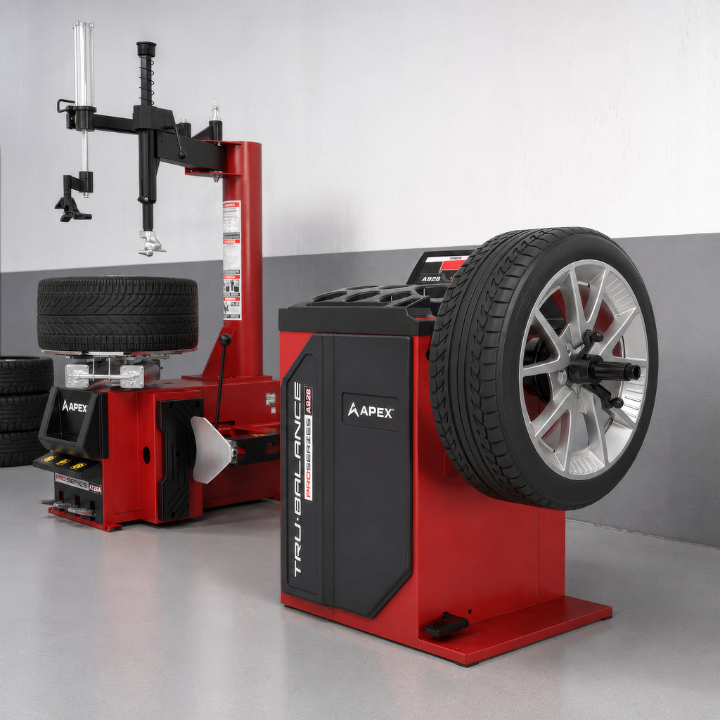 APEX AB28 wheel balancer and AT26A tire changer combo positioned in a professional mechanic shop.