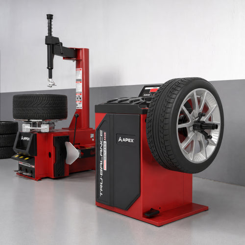 APEX AB28 wheel balancer and AT26 tire changer combo positioned in a professional mechanic shop.
