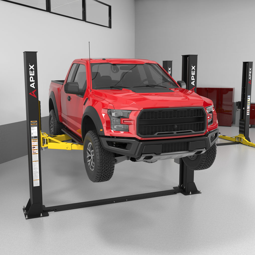 APEX AL9LC 9,000-lb. two-post floorplate lift for professional garages.