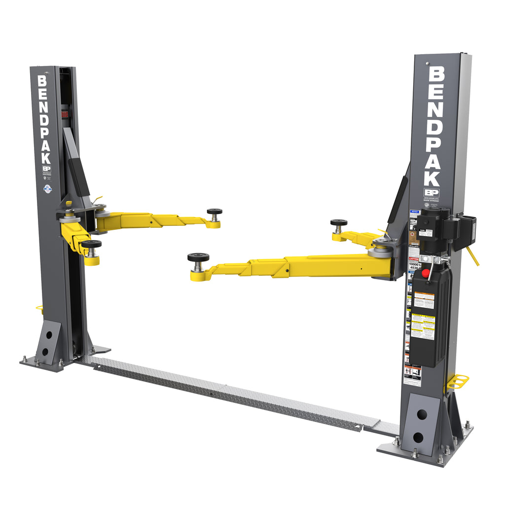 BendPak 10AP-SRT short-rise floorplate two-post lift with adjustable lifting arms and a 10,000-lb. capacity.
