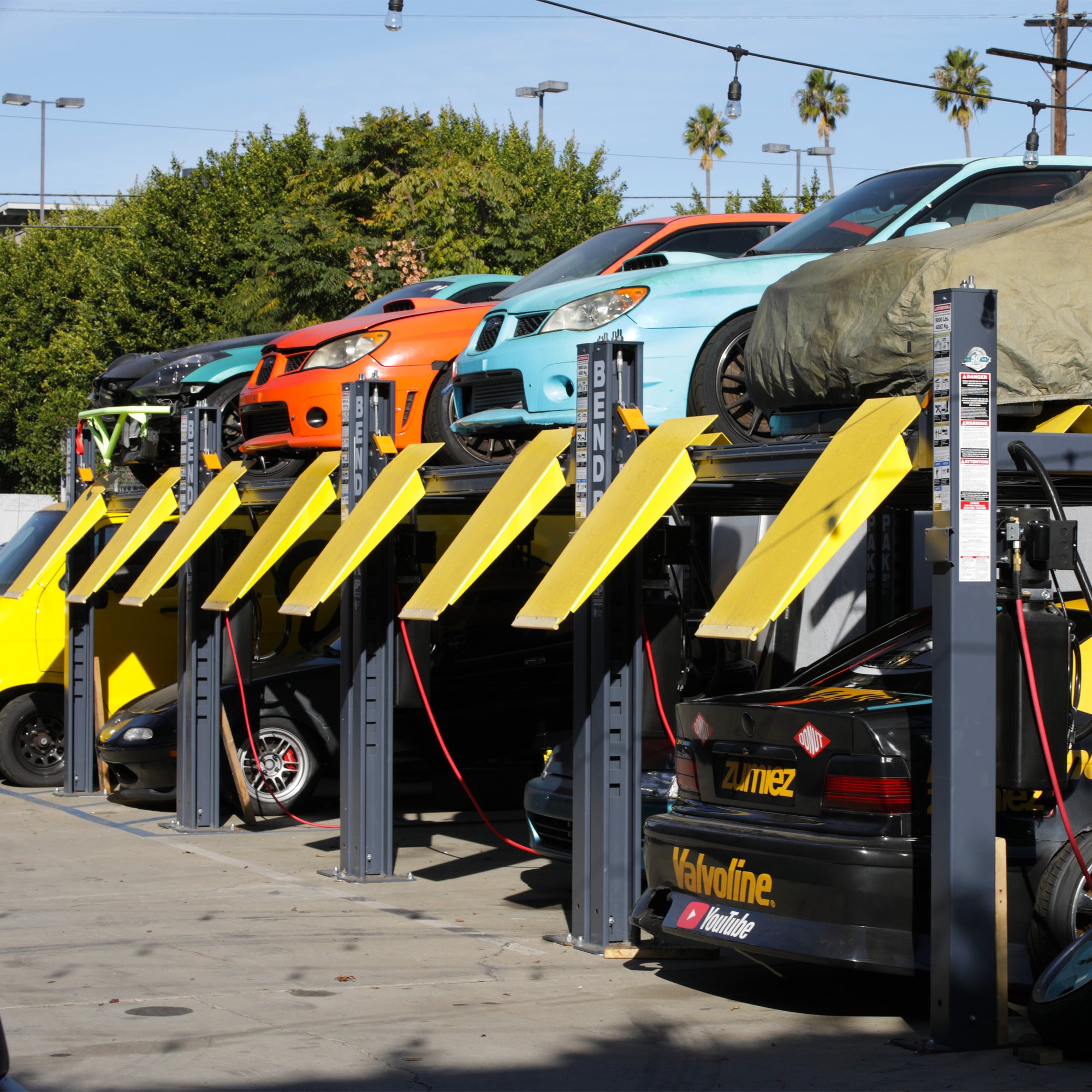 BendPak HD-9 four-post car lift built for home garage parking and service