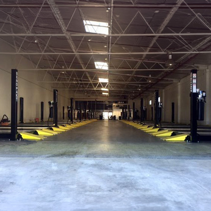 BendPak HD-9STX 9,000-lb. four-post lift for dependable parking and service use