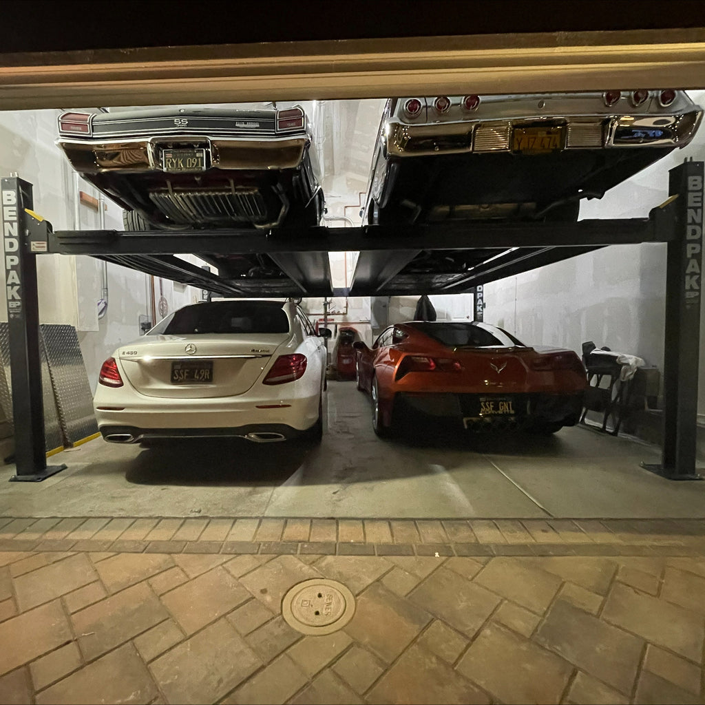 BendPak HD-9SWX 9,000-lb. dual-platform lift for maximizing garage parking space.