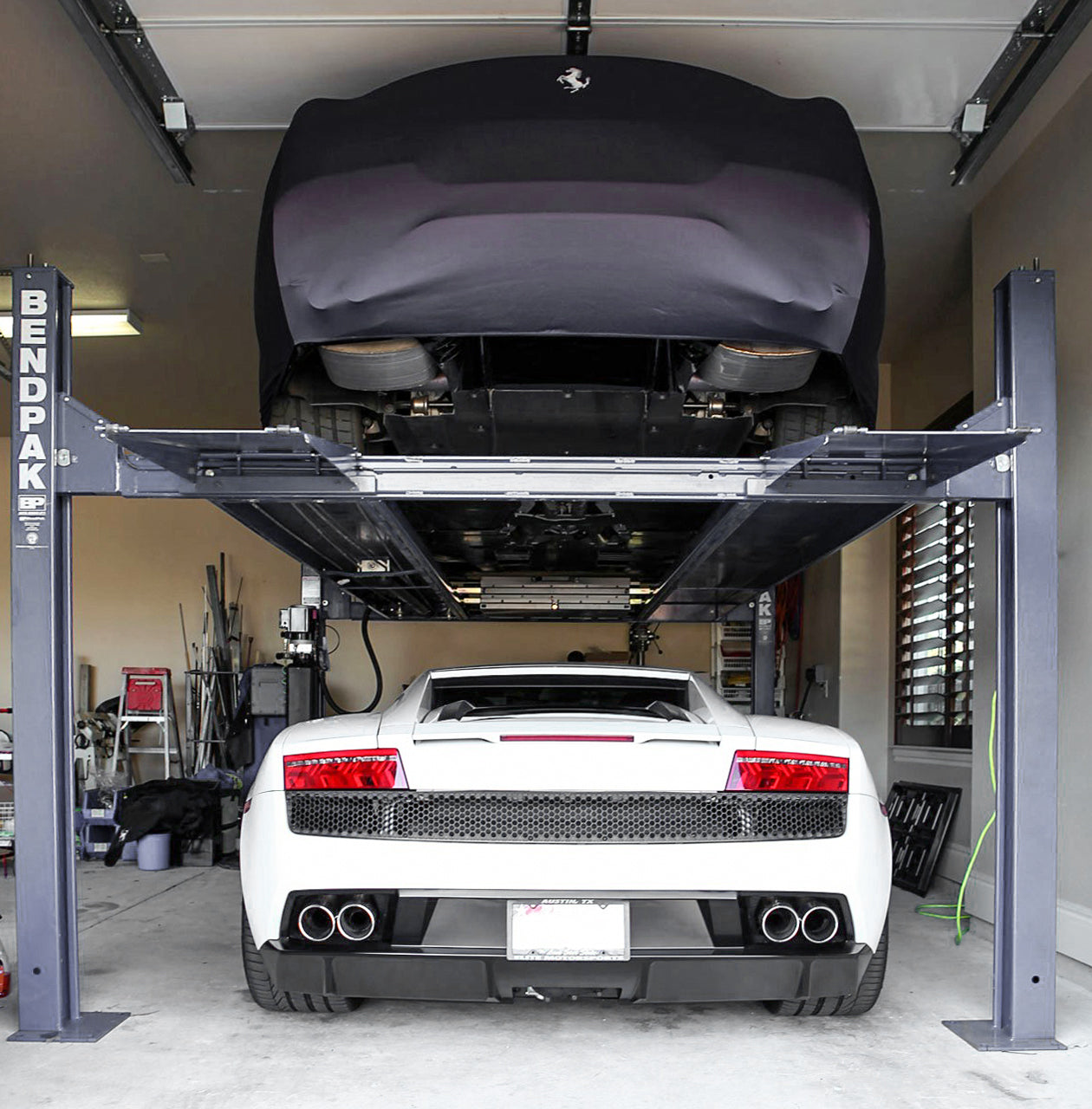 BendPak HD-9XL 9,000-lb. four-post garage lift for storage and underbody work
