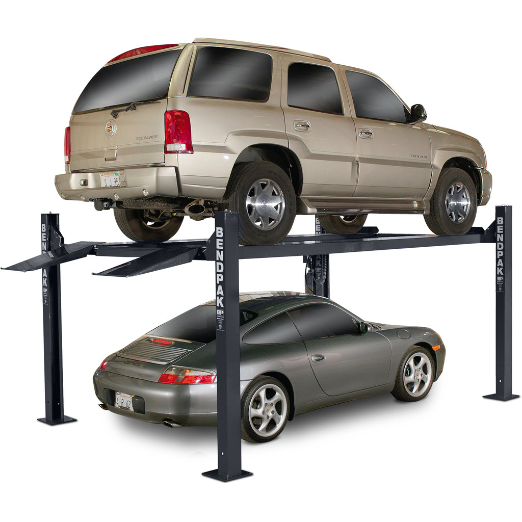 BendPak HD-9XL extended-length four-post car lift for vehicle storage and service.