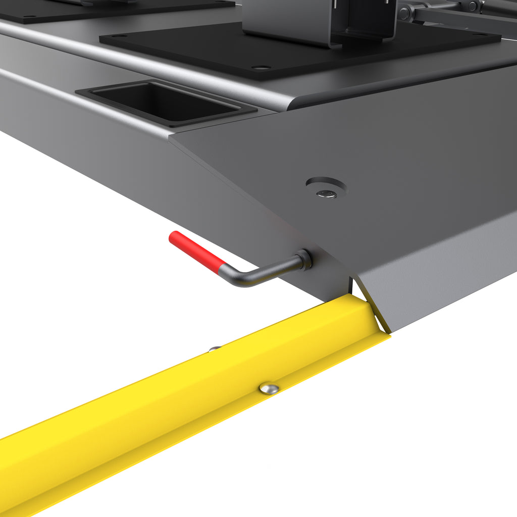 BendPak LR-10000 low-rise lift safety release detail for controlled lowering operation.