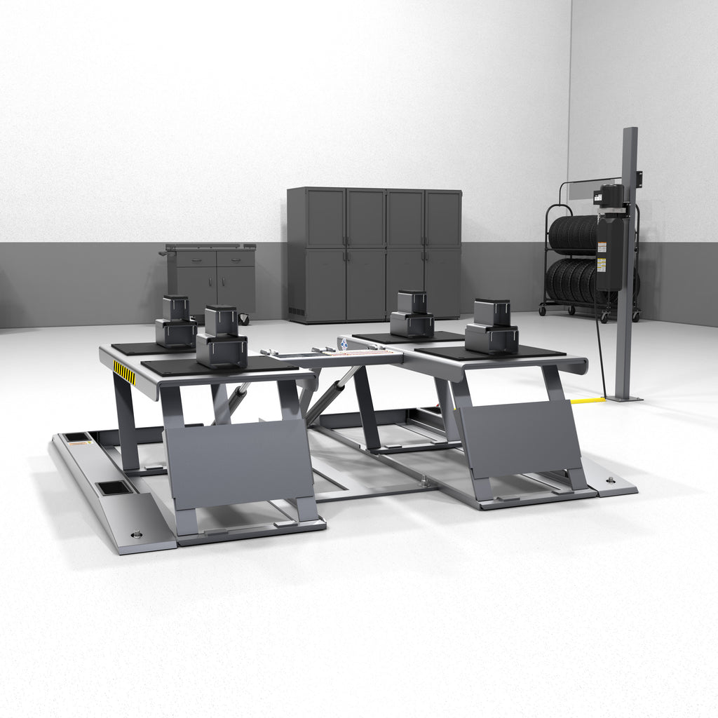 BendPak LR-10000 professional low-rise lift system with drive-over ramps for shop service.