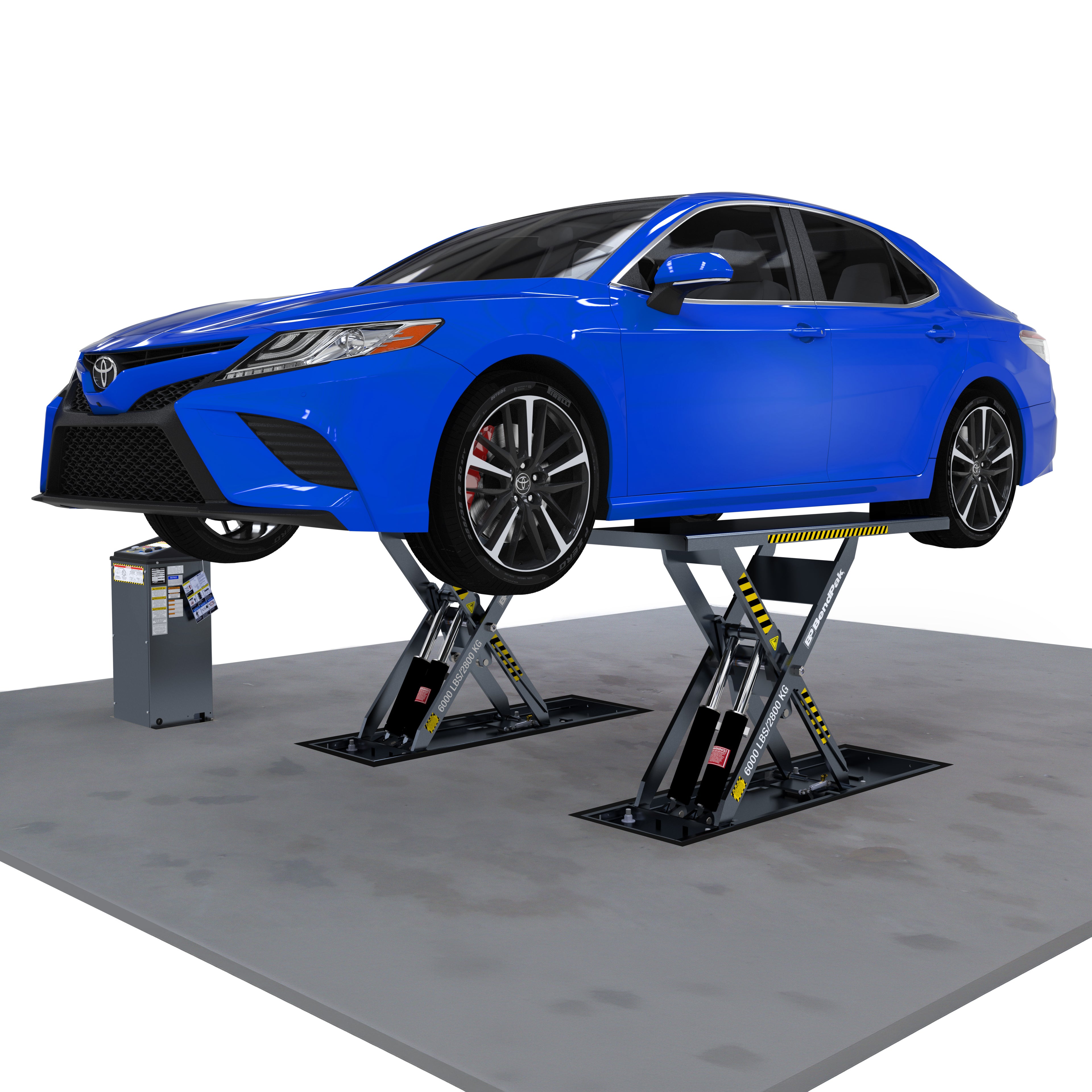 Sedan raised on a BendPak MDS-6LPF open-center flush-mount mid-rise scissor lift with a 6,000-lb. capacity and control console.