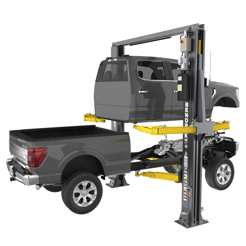 BendPak OctaFlex eight-arm two-post lift independently supporting a pickup cab and chassis with 12,000-lb. total capacity.