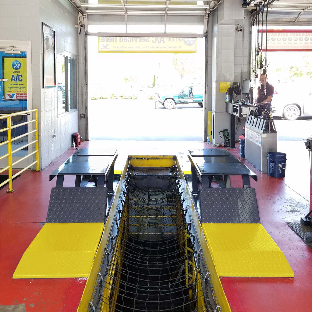BendPak P-9000LT low-rise lift for oil change service bays