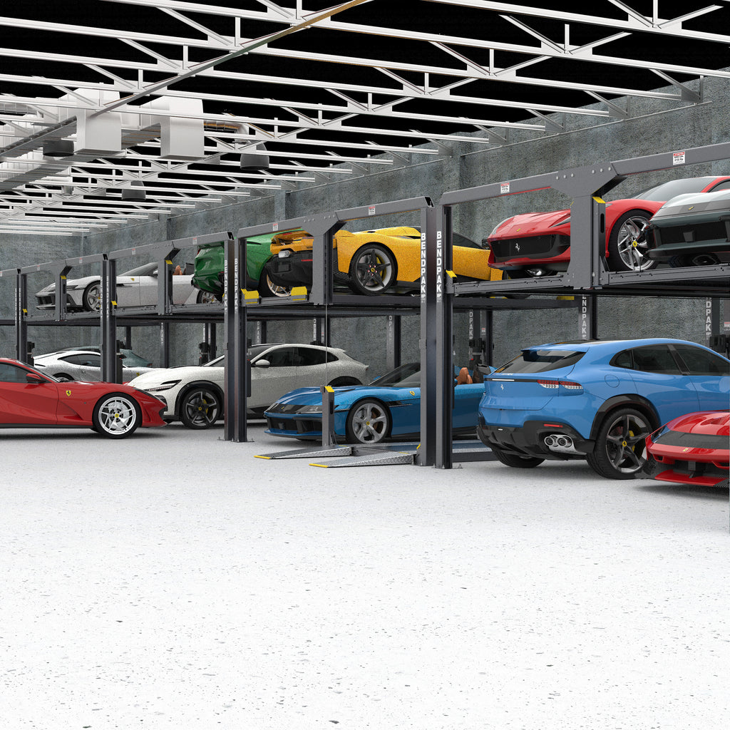 BendPak PL-12000KDT extended-rise tandem parking lift with narrow platforms for luxury cars.