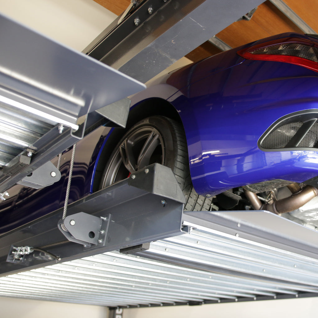 BendPak PL-6KT triple parking lift with independent low-profile vehicle platforms.