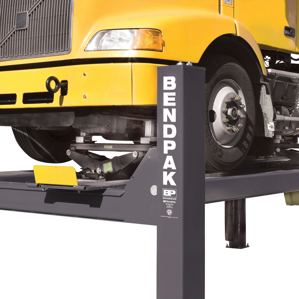 BendPak RBJ25000 rolling bridge jack lifting a semi truck for heavy-duty service work.