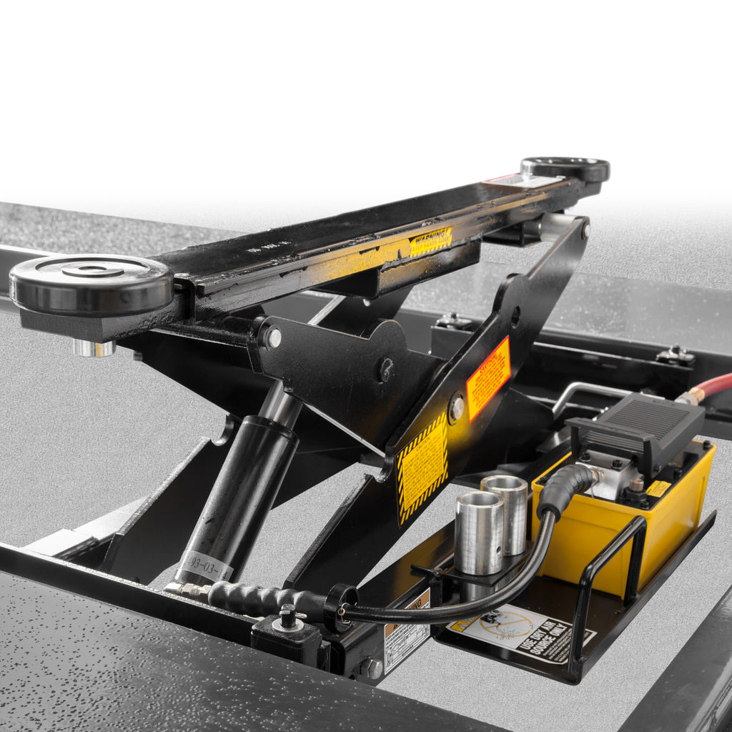BendPak RJ6W easy-roll rolling bridge jack with 6,000-lb. capacity on four-post lift runways.