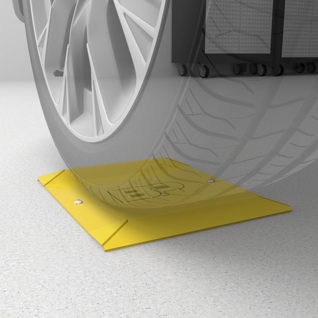 BendPak wheel spotting dish kit mounted under tire for parking alignment