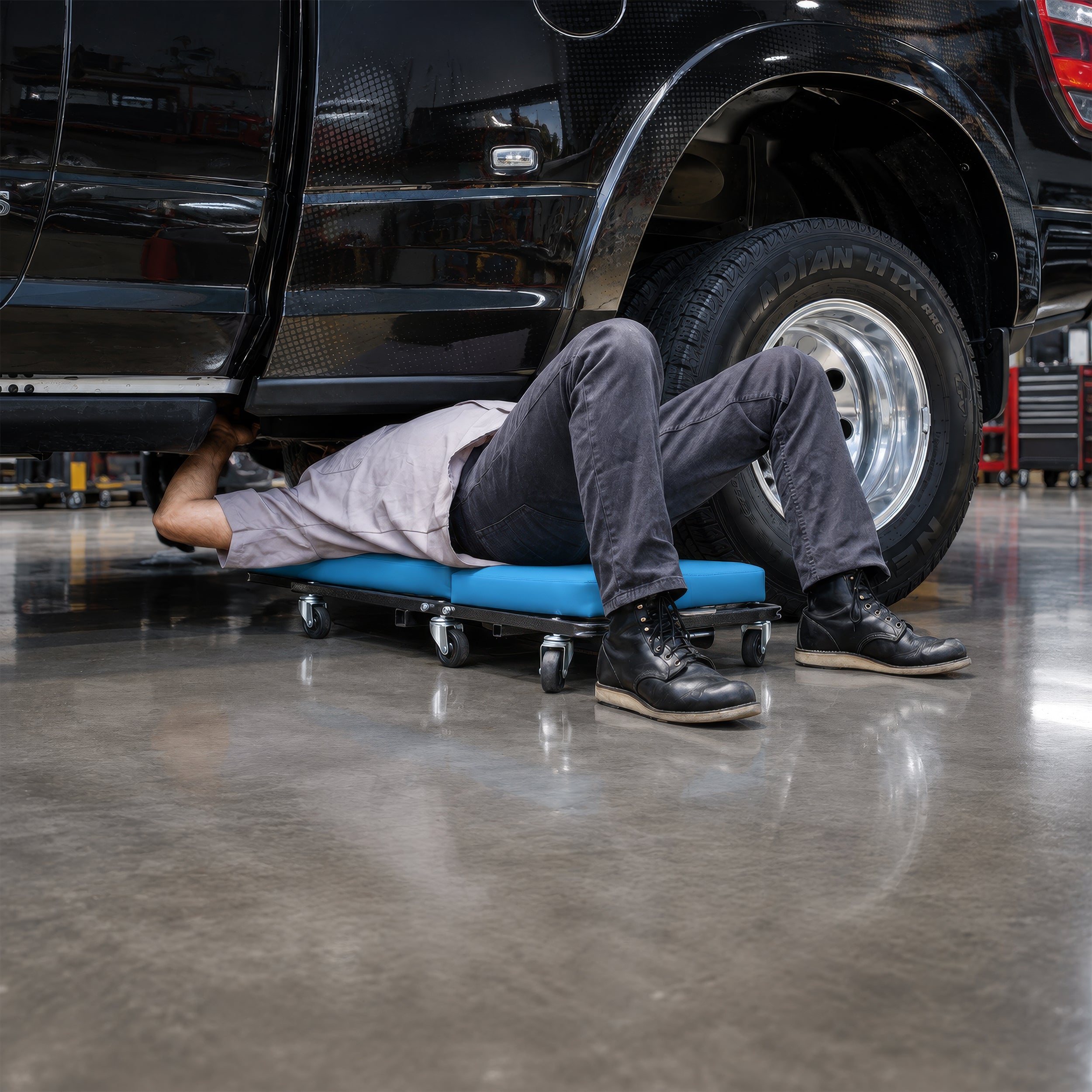 Ergochair Ergo-Glide ergonomic creeper seat designed for comfortable, heavy daily use in automotive shops.