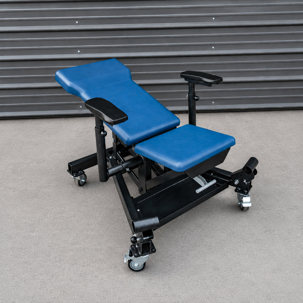 Ergochair Ergo-JET ergonomic height-adjustable work seat provides comfortable support for automotive service tasks at different working levels.