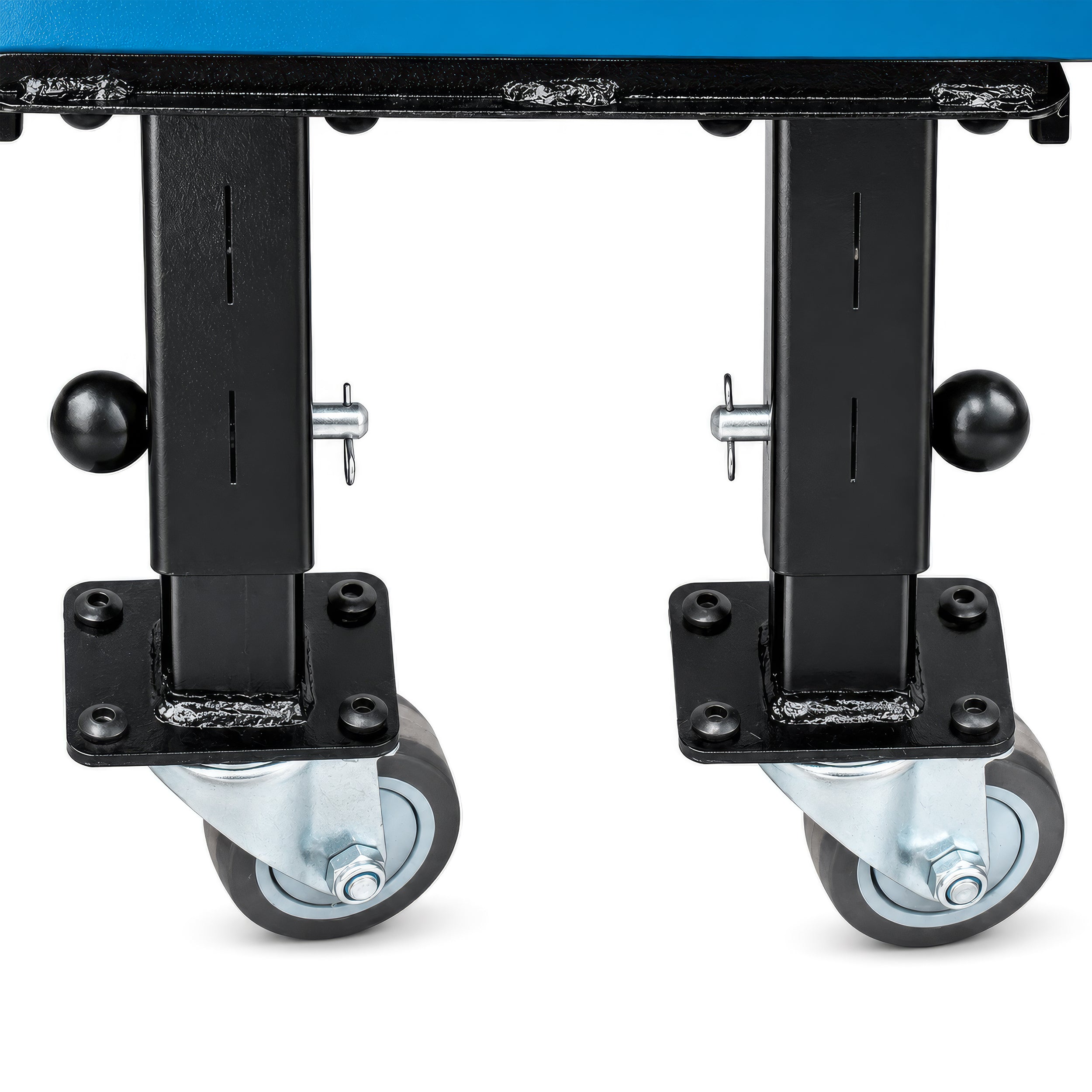 Oil-resistant, non-marking TPR wheels on the Ergochair Ergo-Scoot provide durable mobility across automotive shop floors.