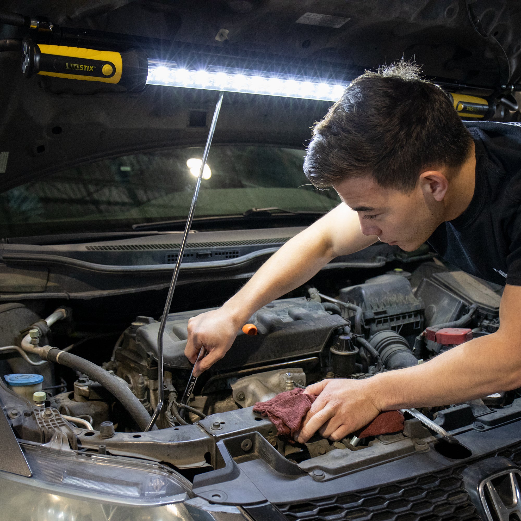 LiteStix work light providing hands-free illumination for automotive repair and inspection