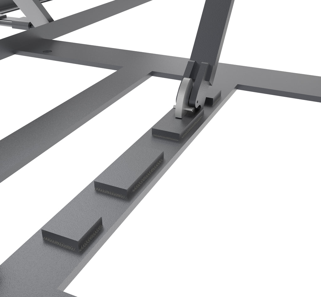 Mechanical safety lock and welded locking blocks on the base frame of a BendPak LR-60P portable scissor lift.