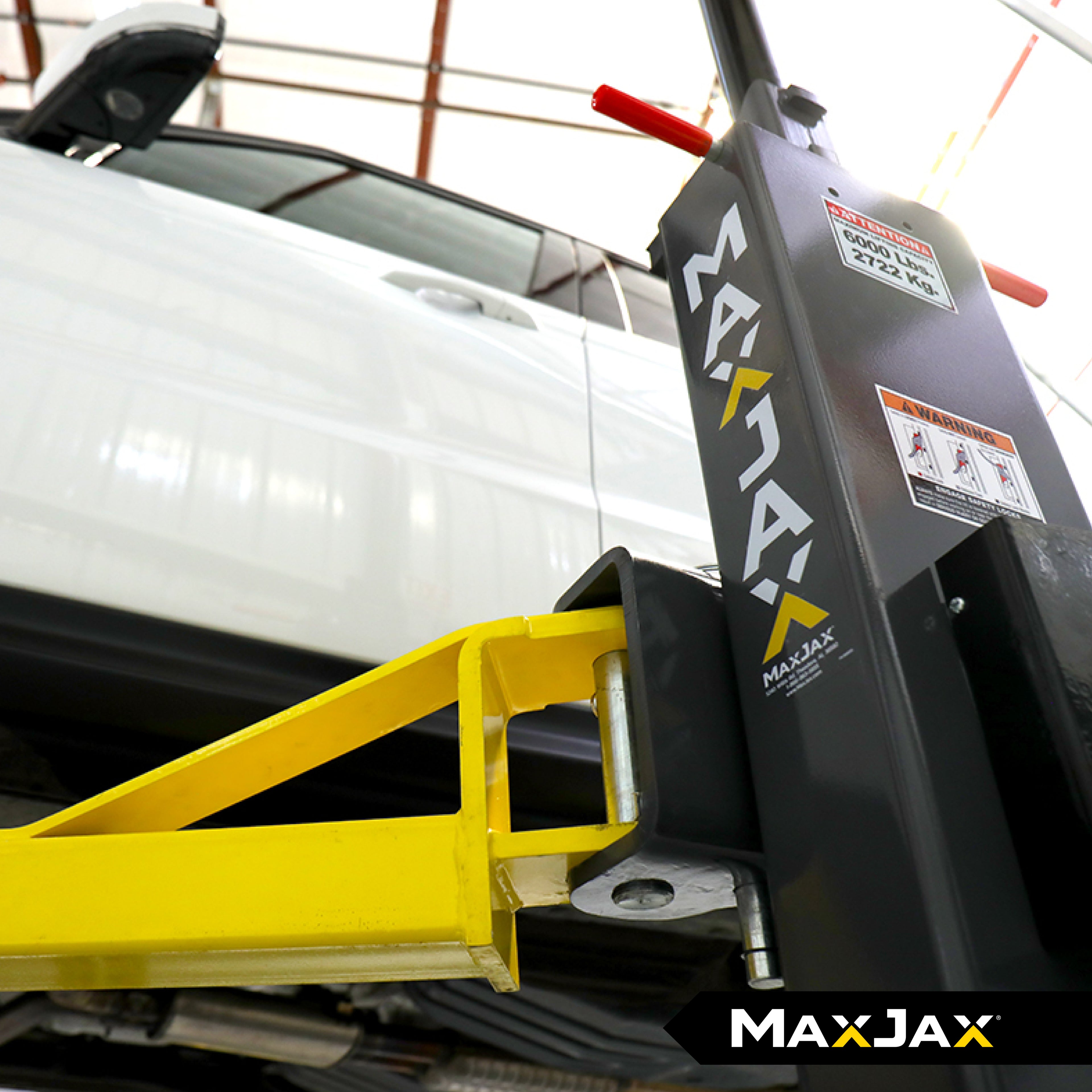 MaxJax M7K 7,000-lb. portable two-post lift designed for residential garage maintenance and repair.