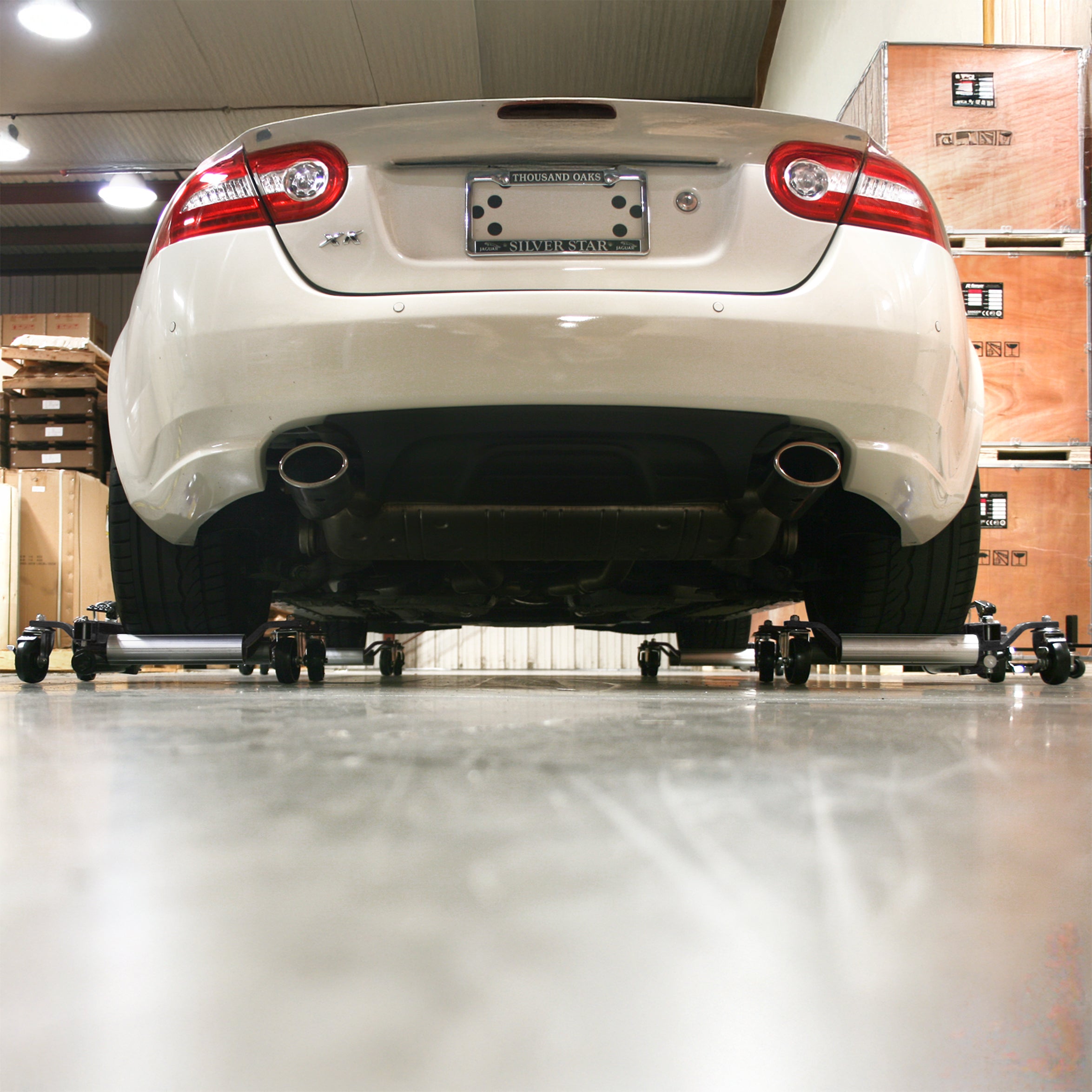 Ranger RCD-1500 car dollies moving vehicle across garage floor