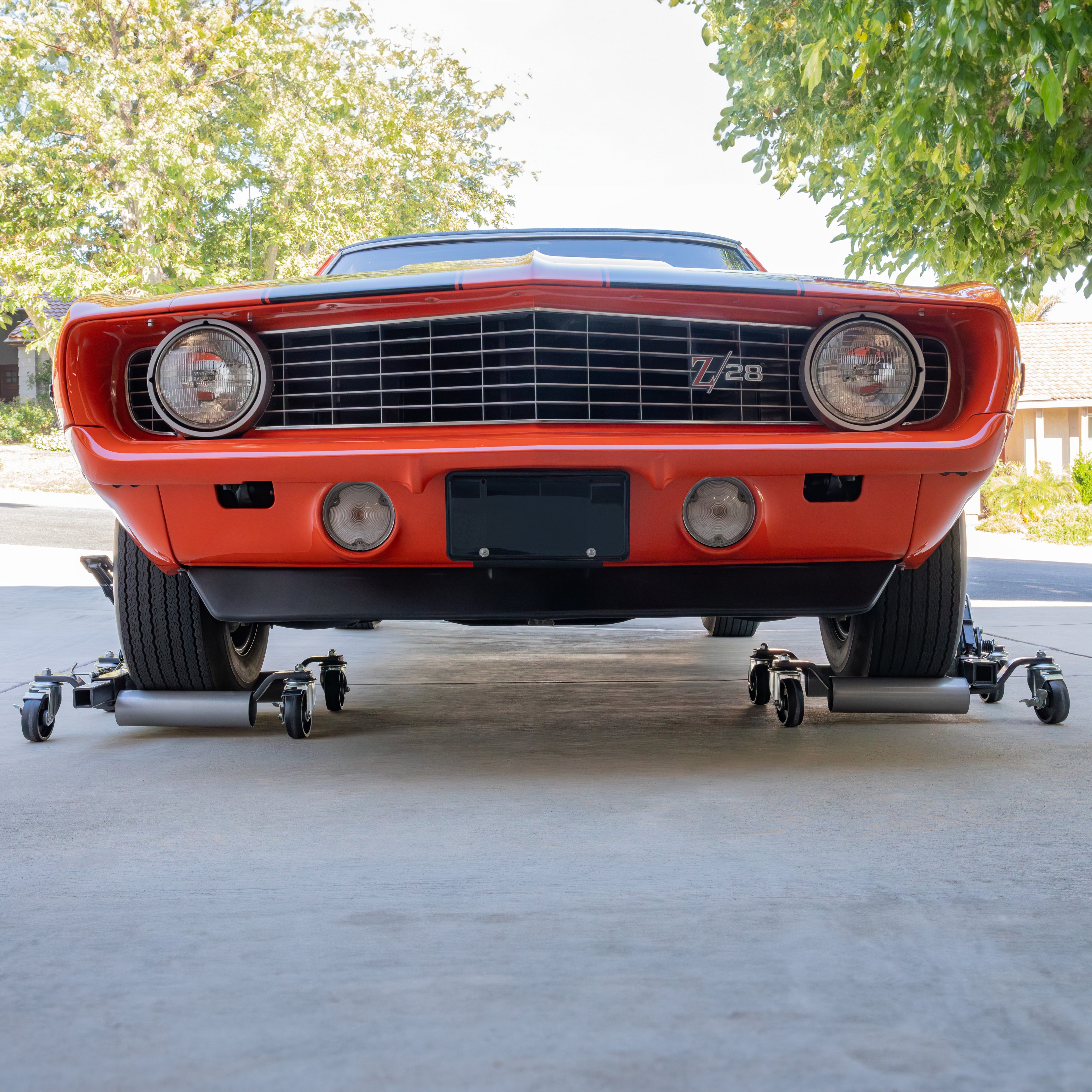 Ranger RCD-1500MP car moving dollies positioning a muscle car on a driveway
