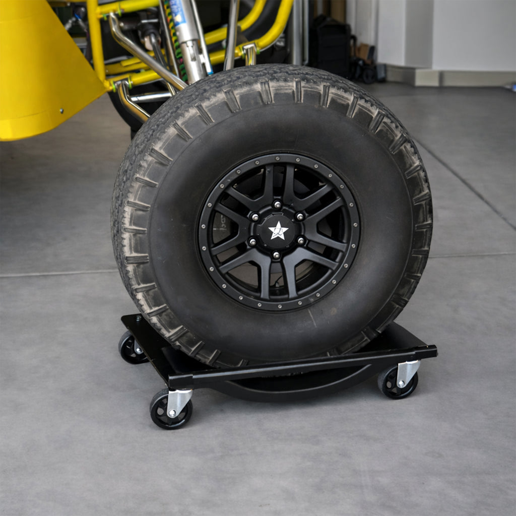 Ranger RCD-1TD wheel dolly moving off-road vehicle in garage