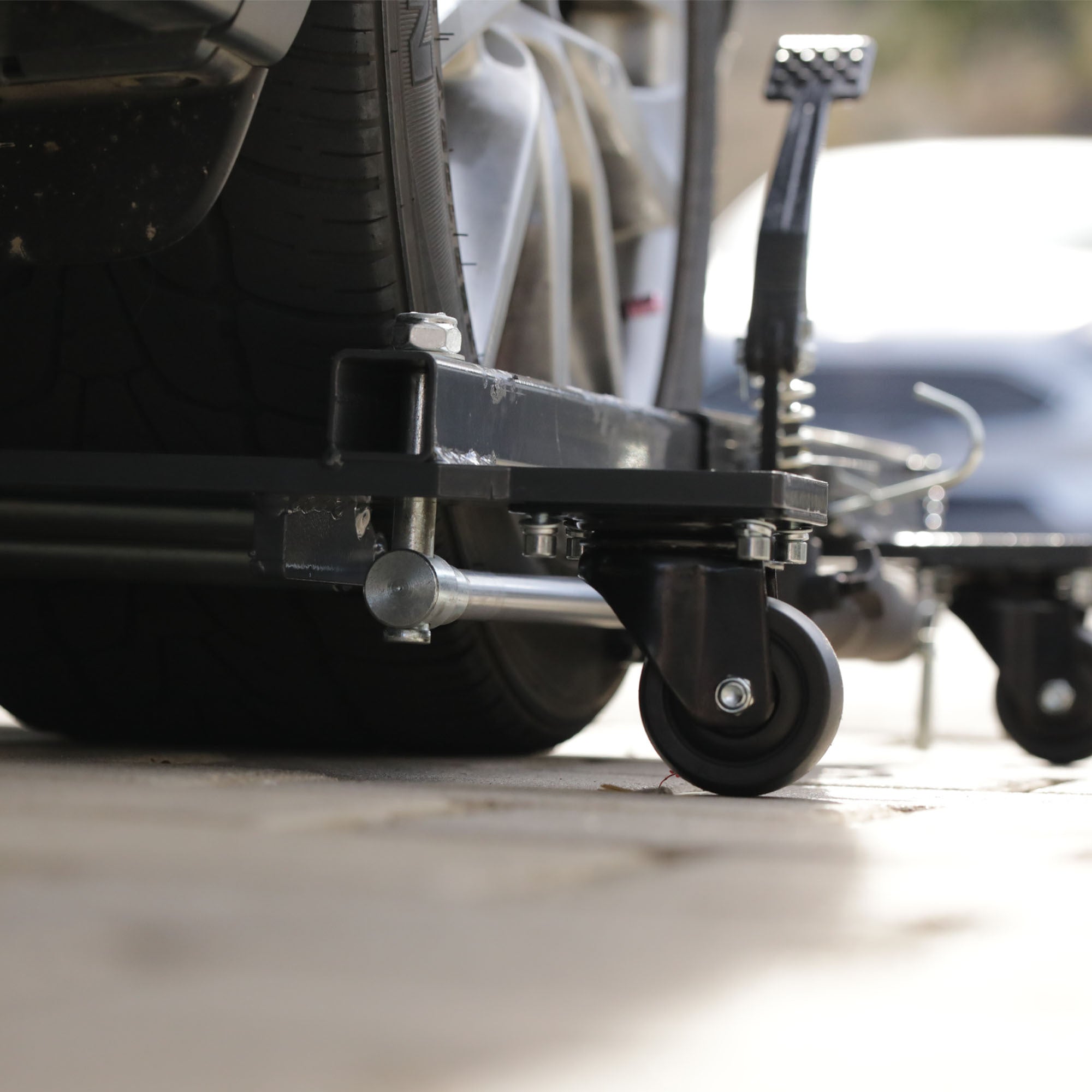 Ranger RCD-2500 car dollies used to move vehicle in garage or shop