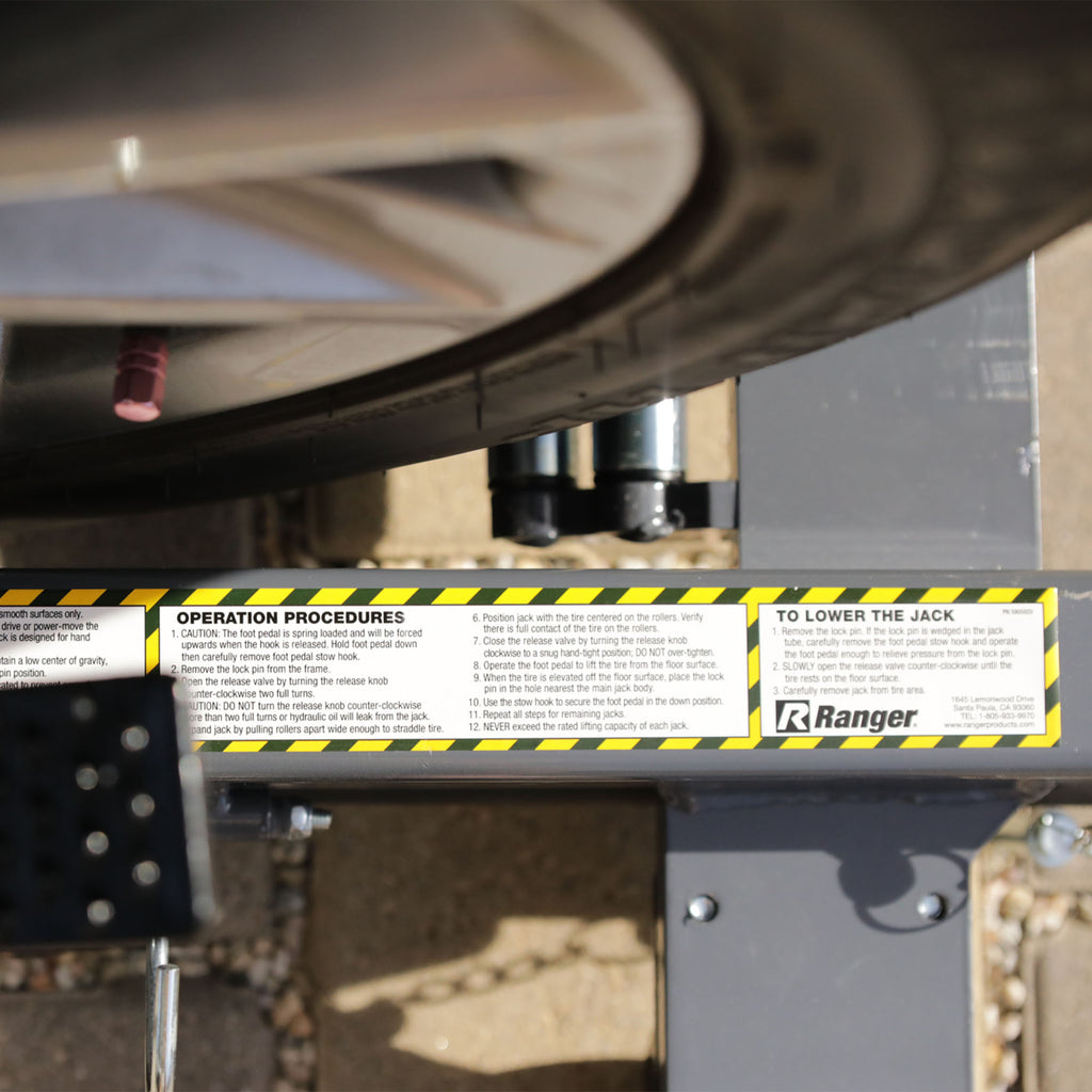 Ranger RCD-2500 car dollies supporting vehicle for garage positioning