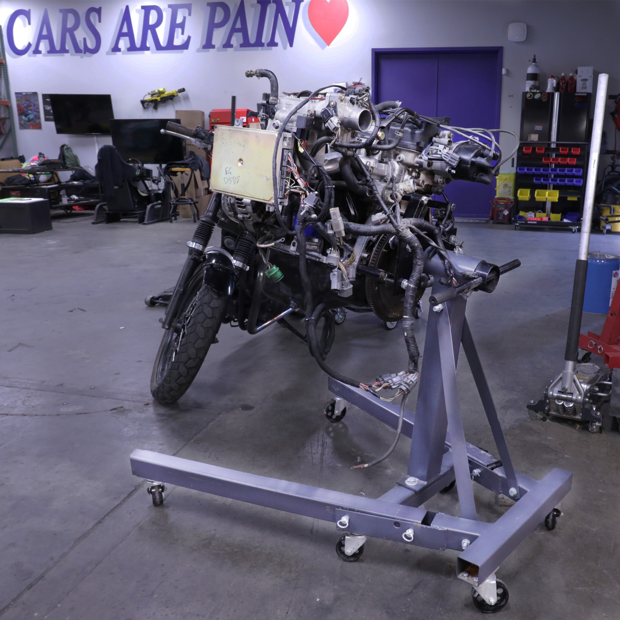 Ranger RES-1TF engine stand with folding design for space-saving shop storage