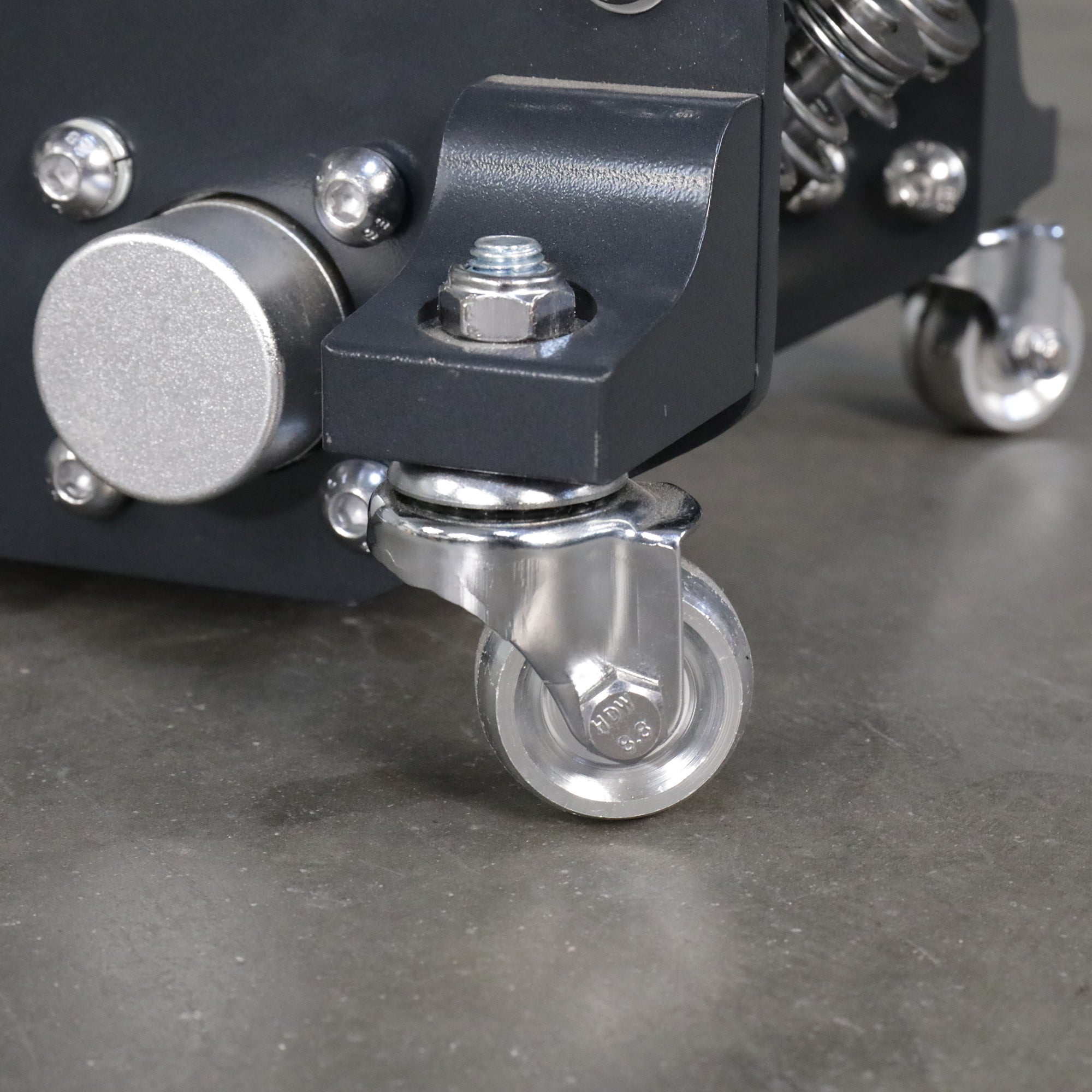 Ranger RFJ-4000AL floor jack caster detail showing rolling mobility for garage positioning.