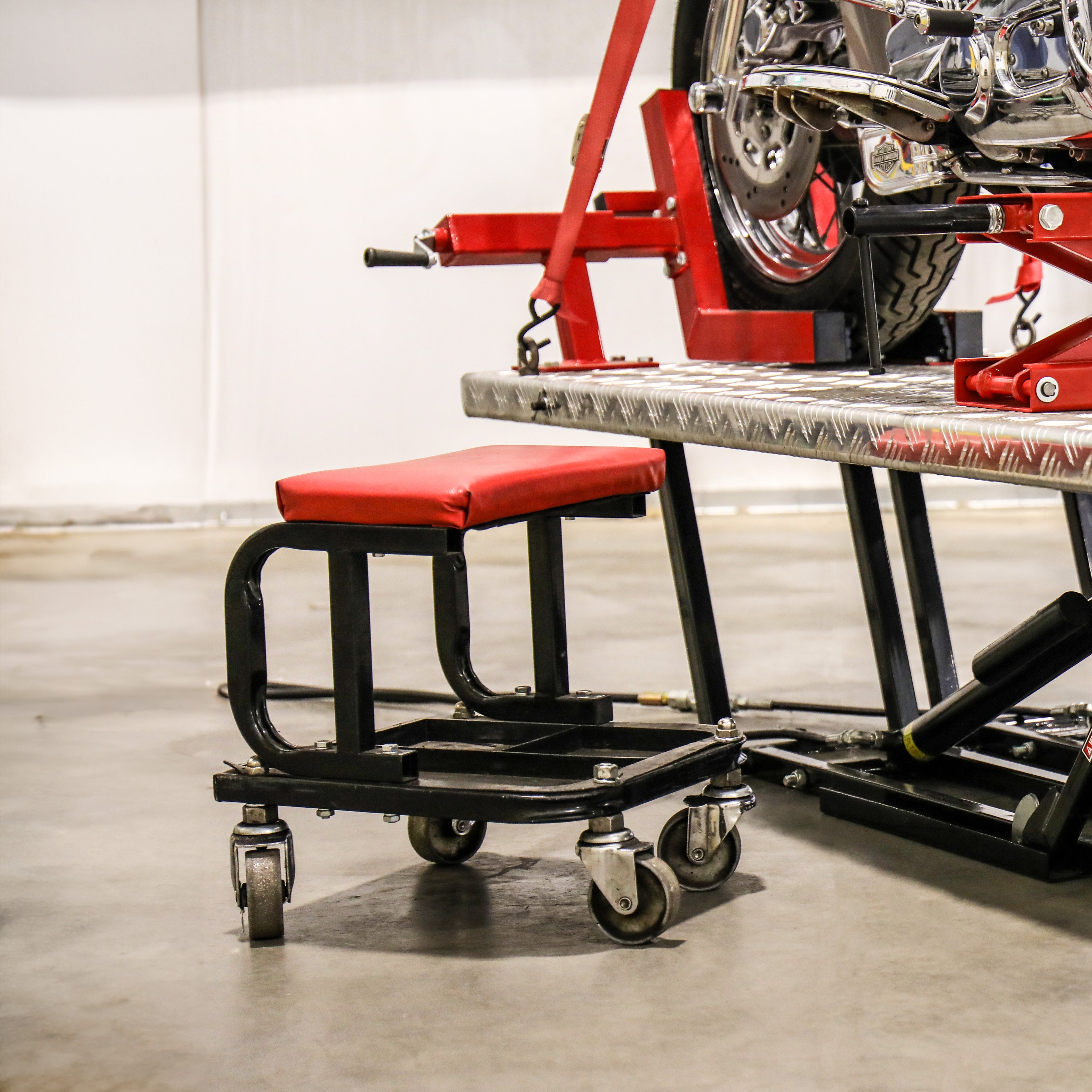 Ranger RST-1WS rolling mechanic seat with durable casters and tool tray storage
