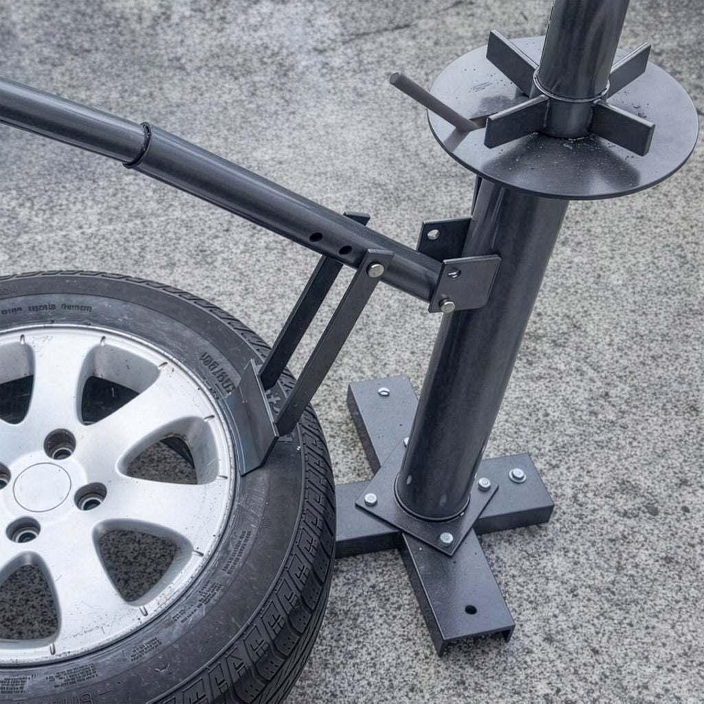Ranger RWS-3TC manual tire changer shown breaking tire bead during wheel service
